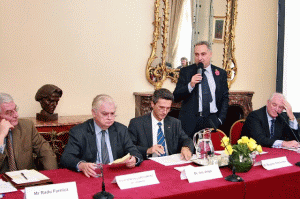 Bogdan Patriniche, speaking at the Conference of Romanian Students, Professors and Researchers in Great Britain, in 2010. To the left, cut off by the edge of the photo, we have Mr. Radu Furnica, the recruiter of Patriniche for the BSE.