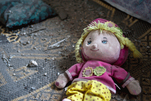 A doll is seen on the floor of a house destroyed in an Israeli airstrike in Gaza City, on Nov. 18, 2012. As of Sunday evening, the number of Palestinians killed by the Israeli attacks in Gaza has climbed to 70, including 20 children, eight women and nine old men, with more than 600 others injured.