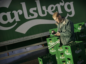 "Carlsberg" continuă planul de reducere a cheltuielilor