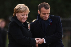 Angela Merkel şi Emmanuel Macron (Sursa foto: Twitter)