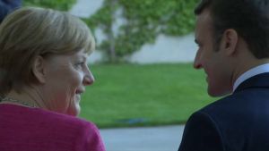 Angela Merkel şi Emmanuel Macron (Sursa foto: Twitter)