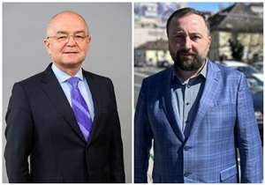 Emil Boc, PNL (stânga) şi Călin Cozma, AUR