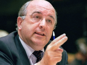 Joaquin Almunia threatens to cut European Commission funding to Romania.