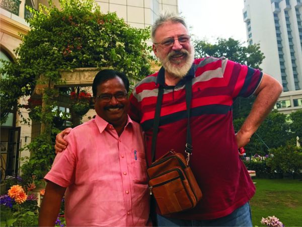 Make, with his Indian buddy in India