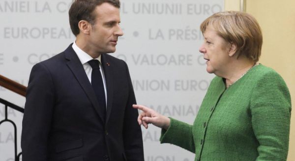 Emmanuel Macron şi Angela Merkel (Sursă foto: Twitter)