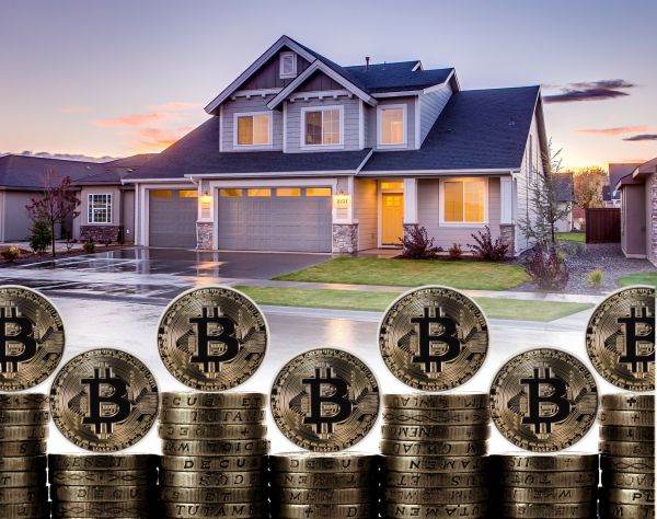 Americanii pot să cumpere imobiliare cu Bitcoin