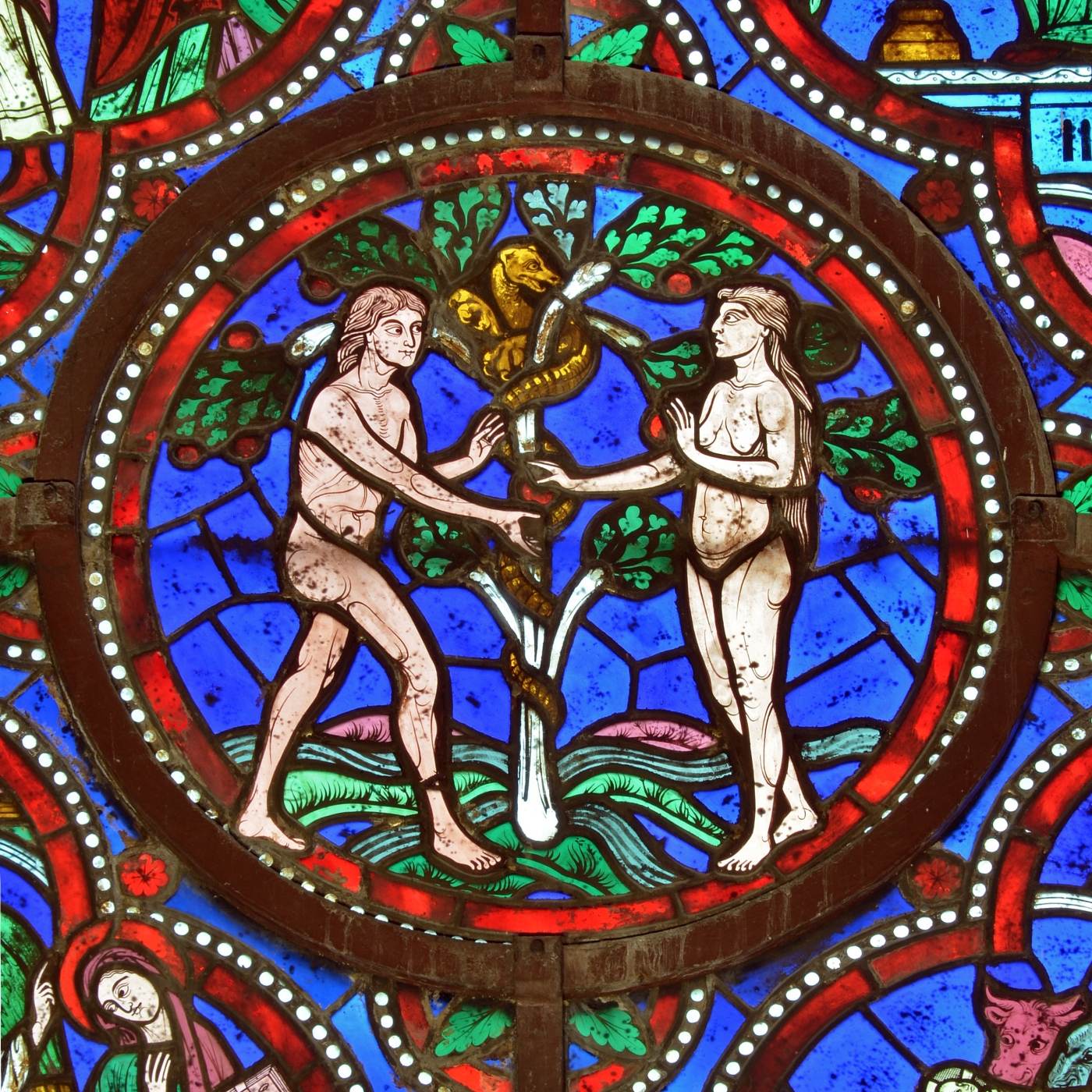 "Temptation of Adam and Eve", detail on a stained glass (18th Century, restored in the 19th Century) in the Chapel of the Virgin - Saint-Julien Cathedral - Le Mans (Sarthe, France)